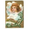 n°20387 - Carte Gaufrée - A Merry Christmas - Portrait d'un ange au-dessus d'un village