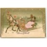 n°20785 - Carte Gaufrée - Vroolijk Kerstfeest - Femme dans un Traineau tiré par un Cheval (couverture en tissu)