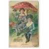 n°21286 - Carte Gaufrée - Bonne et Heureuse Année - Deux jeunes gens assis sous un champignon